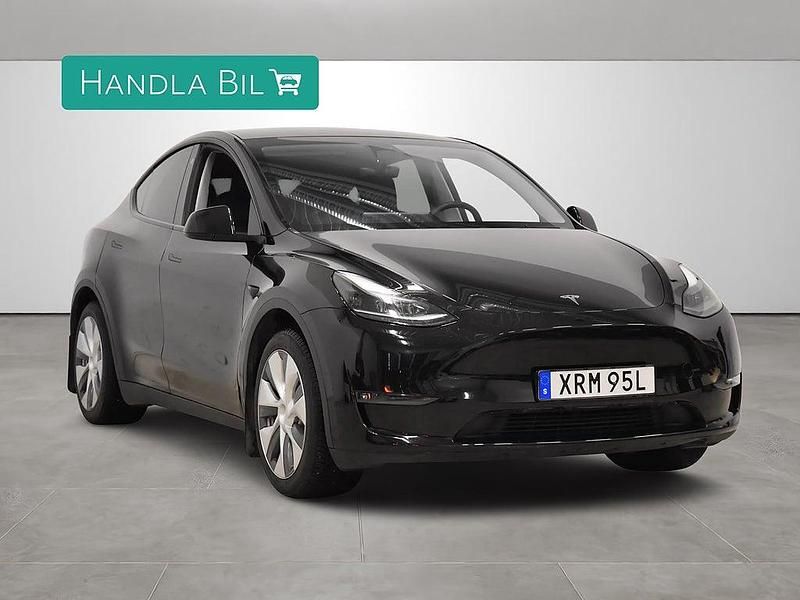 Begagnad Tesla Model Y Long Range AWD 378 kW (514 HK) 2023 Svart SUV