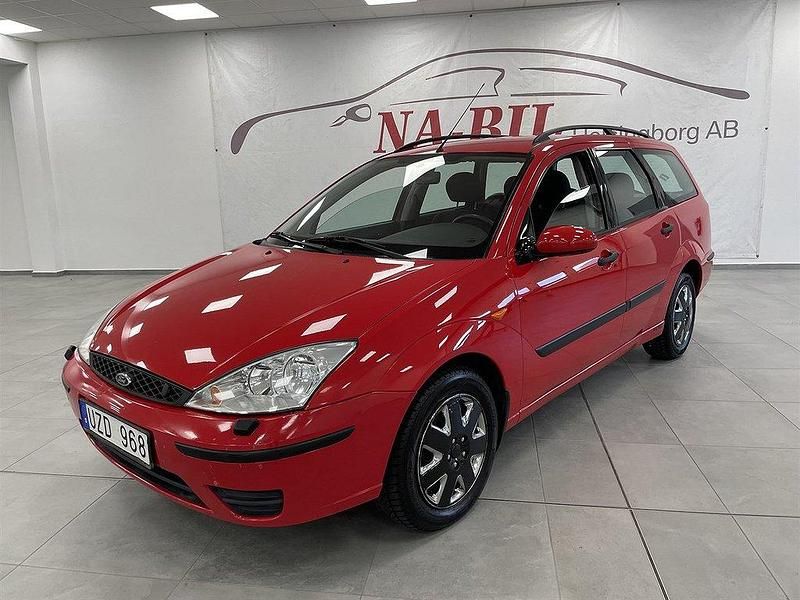 Röd Begagnad 2004 Ford Focus Kombi | 24 900 kr (Marknadspris) - Bild 1/4