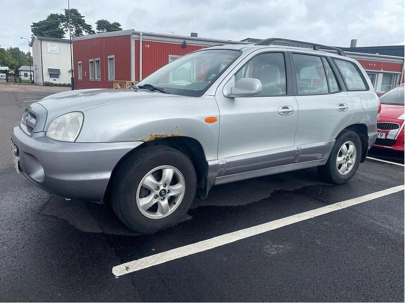 Silver Begagnad 2005 Hyundai Santa Fe SUV | 14 900 kr (Lite dyr) - Bild 1/4