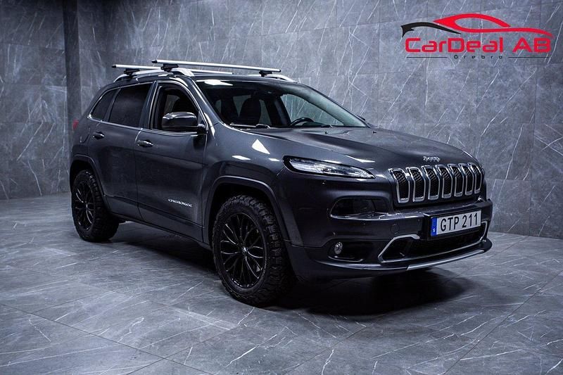 Grå Begagnad 2015 Jeep Cherokee SUV | 129 800 kr (Marknadspris) - Bild 1/4