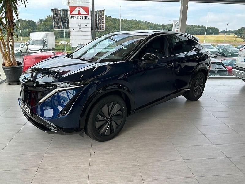 Blå Ny 2024 Nissan Ariya Advance SUV | 576 200 kr (Marknadspris) - Bild 1/4