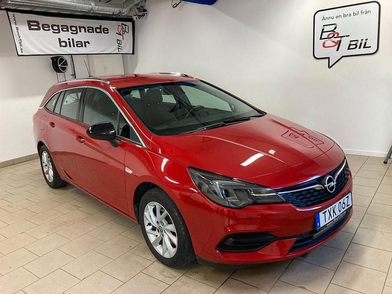 Röd Begagnad 2021 Opel Astra Sport Kombi | 179 900 kr (Marknadspris) - Bild 1/4