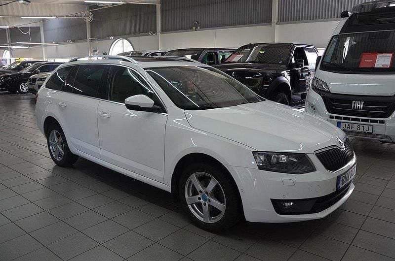 Vit Begagnad 2014 Skoda Octavia Elegance Kombi | 99 900 kr (Marknadspris) - Bild 1/4