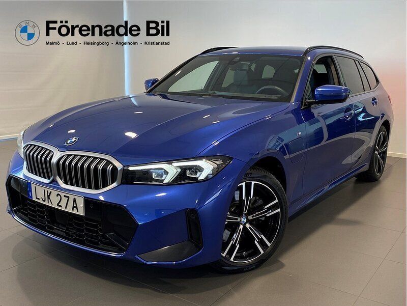 Blå Begagnad 2024 BMW 330e M Sport Kombi | 569 000 kr (Lite dyr) - Bild 1/4