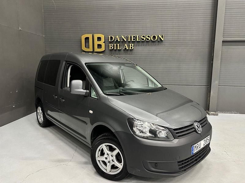 Mörkgrå (grå) Begagnad 2012 VW Caddy Life Minibuss | 59 800 kr (Marknadspris) - Bild 1/4