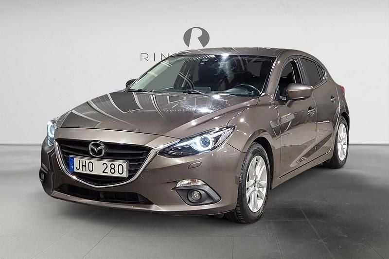 Brun Begagnad 2013 Mazda 3 Inclusive Halvkombi | 99 900 kr (Marknadspris) - Bild 1/4