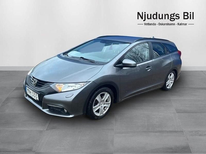 Mörkgrå Begagnad 2014 Honda Civic Sport Kombi | 79 900 kr (Marknadspris) - Bild 1/4