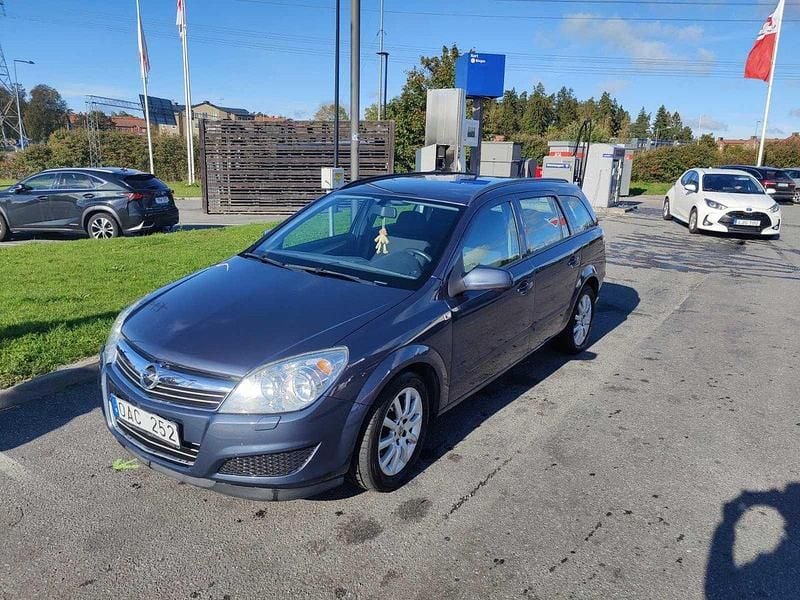 Blå Begagnad 2009 Opel Astra Kombi | 25 000 kr (Marknadspris) - Bild 1/4