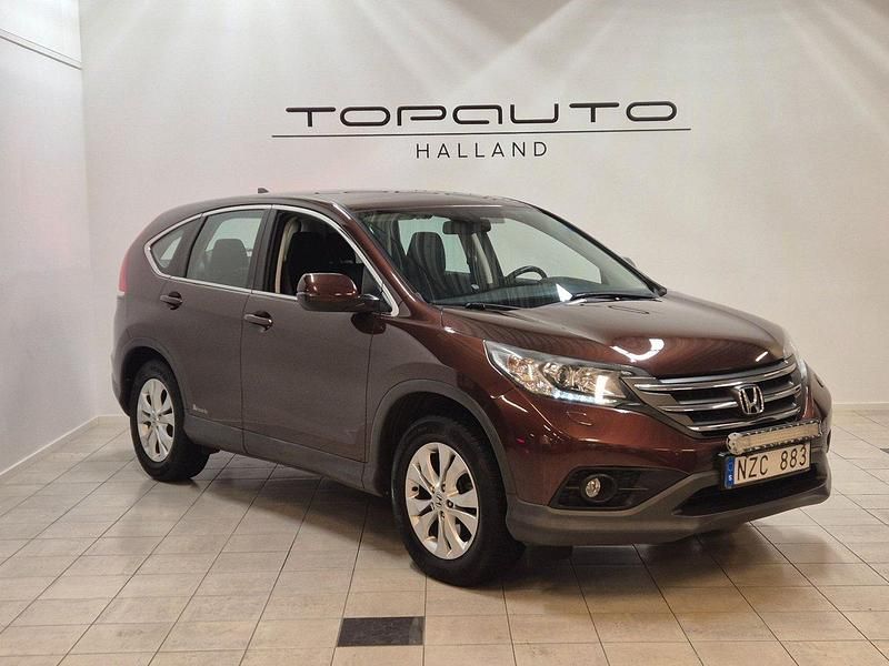Ljusbrun (brun) Begagnad 2013 Honda CR-V SUV | 99 900 kr (Marknadspris) - Bild 1/4