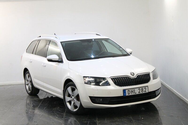 Vit Begagnad 2014 Skoda Octavia Business Line Kombi | 109 900 kr (Marknadspris) - Bild 1/4