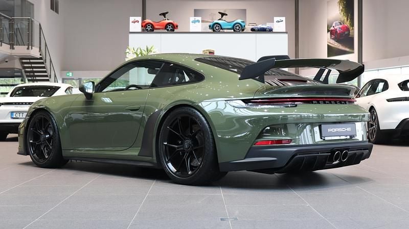 Begagnad Porsche 911 517 HK (380 kW) 2021 Mörkgrön