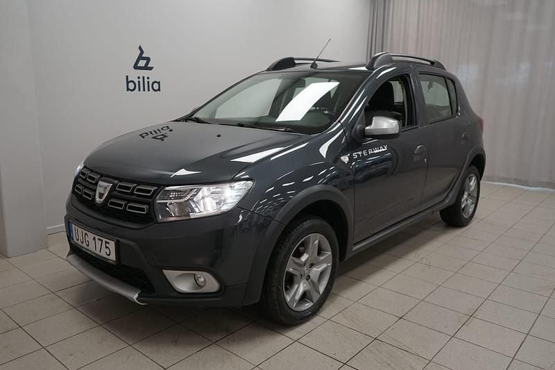 Mörkgrå Begagnad 2016 Dacia Sandero Stepway Halvkombi | 79 900 kr (Marknadspris) - Bild 1/3