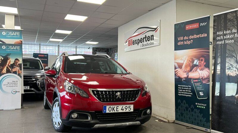 Mörkröd Begagnad 2016 Peugeot 2008 SUV | 109 900 kr (Marknadspris) - Bild 1/4
