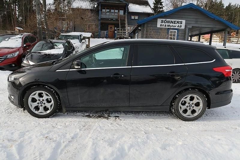 Begagnad Ford Focus Titanium 125 HK (91 kW) 2014 Svart Kombi