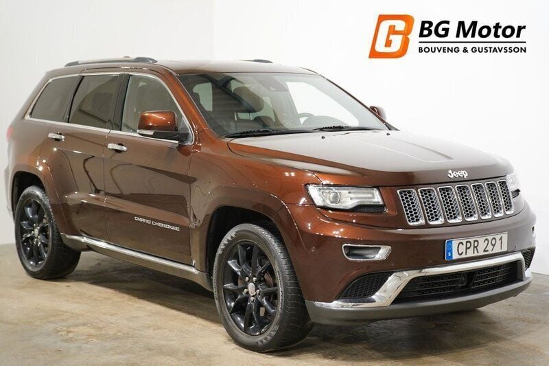 Brun Begagnad 2014 Jeep Grand Cherokee Summit SUV | 219 600 kr (Marknadspris) - Bild 1/4
