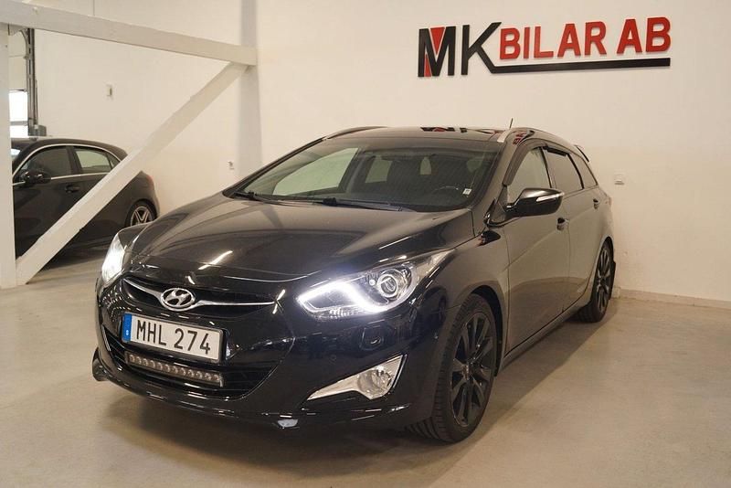 Svart Begagnad 2011 Hyundai i40 Kombi | 124 900 kr (Marknadspris) - Bild 1/4