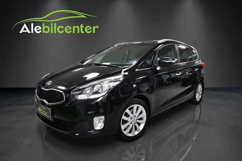 Svart Begagnad 2013 Kia Carens Minibuss | 59 900 kr (Marknadspris) - Bild 1/4