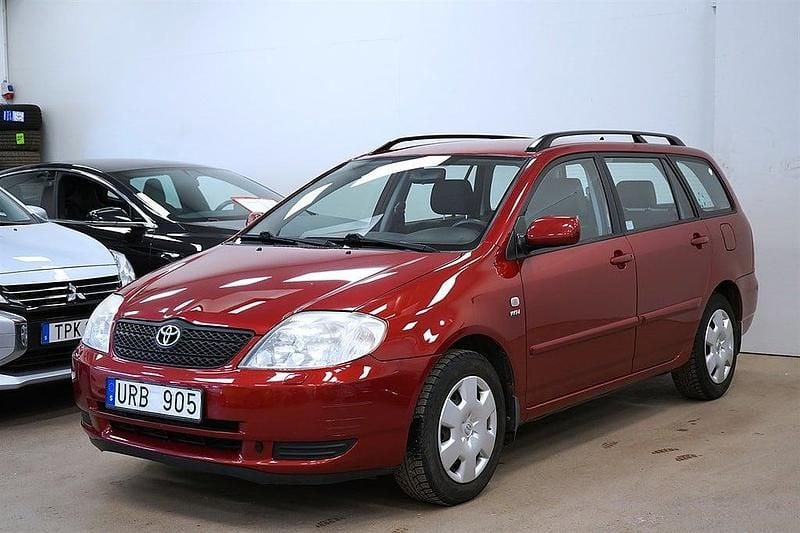 Begagnad Toyota Corolla 110 HK (80 kW) 2003 Rödmetallic Kombi