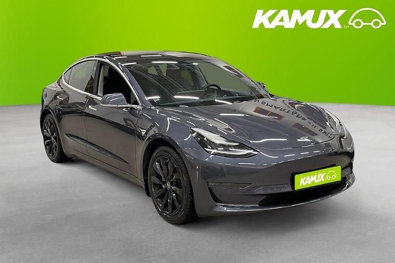 Silver/grå Begagnad 2020 Tesla Model 3 Long Range AWD Sedan | 256 800 kr (Marknadspris) - Bild 1/4