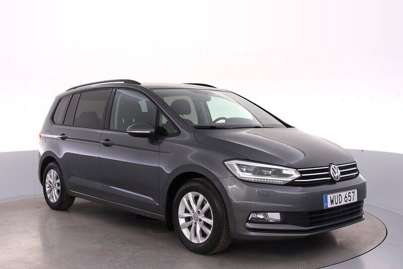 Mörkgrå Begagnad 2016 VW Touran Minibuss | 189 000 kr (Marknadspris) - Bild 1/4