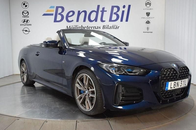 Tanzanite blå met. Begagnad 2022 BMW M440 M Sport Sedan | 699 500 kr (Lite dyr) - Bild 1/3