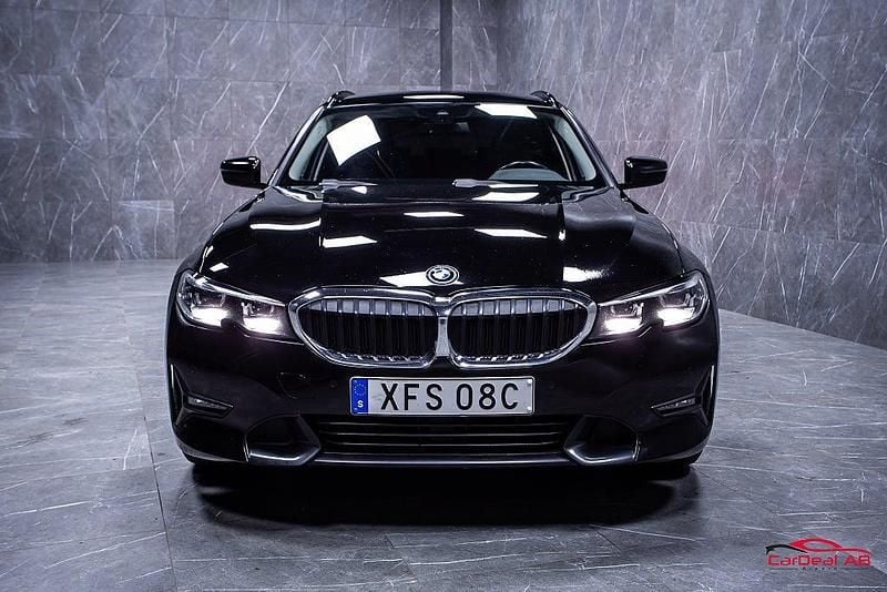 Begagnad BMW 330e Sport Line 184 HK (135 kW) 2021 Svart Kombi