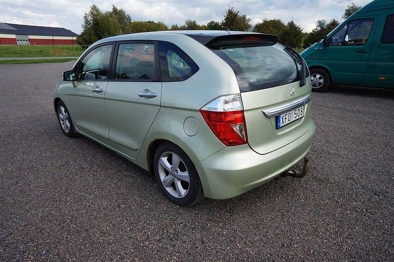 Begagnad Honda FR-V 150 HK (110 kW) 2006 Ljusgrön (grön metallic) Minibuss