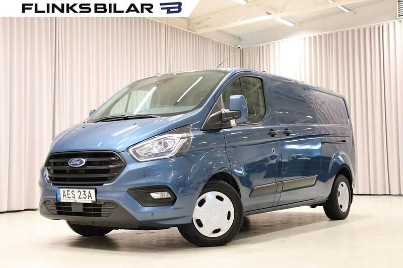 Blå (blå metallic) Begagnad 2020 Ford Transit Custom Van | 299 900 kr - Bild 1/4