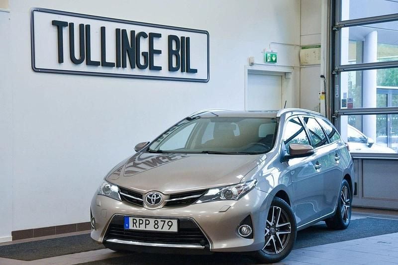 Brun Begagnad 2015 Toyota Auris Touring Sports Edition Kombi | 84 900 kr (Bra pris) - Bild 1/4