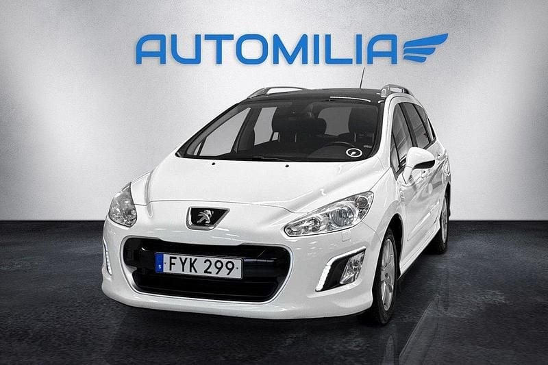 Vit Begagnad 2013 Peugeot 308 Kombi | 49 900 kr (Marknadspris) - Bild 1/4