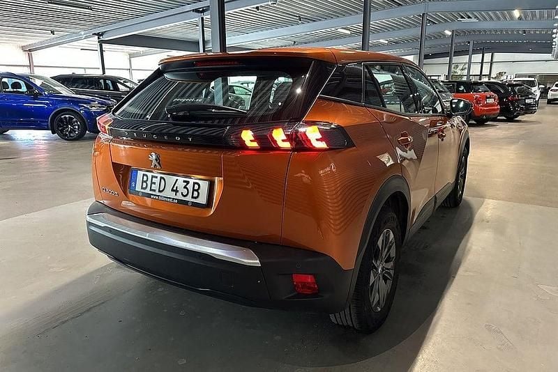 Begagnad Peugeot e-2008 Active 100 kW (136 HK) 2022 Orange SUV