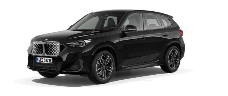 Svart (black sapphire metallic) Ny 2025 BMW iX1 Comfort Edition SUV | 634 100 kr (Marknadspris) - Bild 1/4