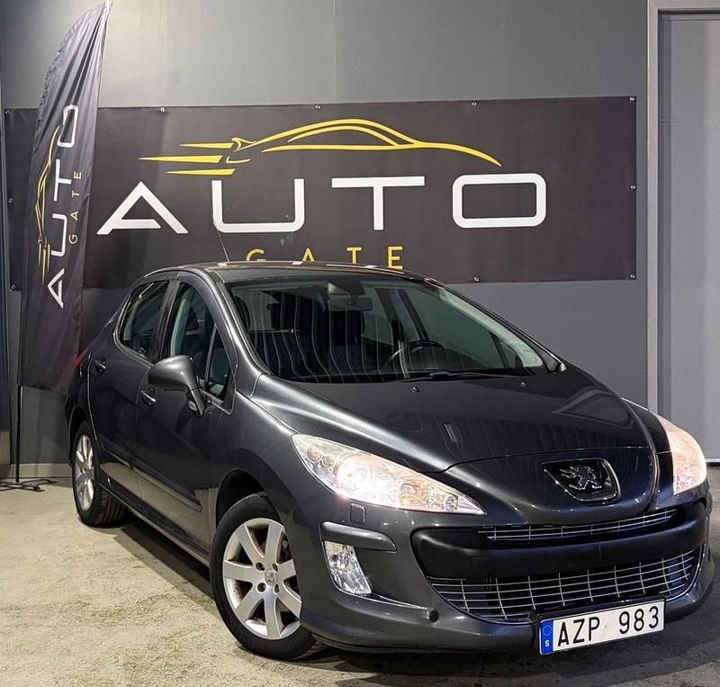Mörkgrå (grå) Begagnad 2009 Peugeot 308 Halvkombi | 54 900 kr (Marknadspris) - Bild 1/4