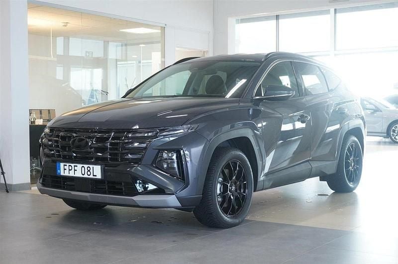 Grå (ecotronic gray) Begagnad 2024 Hyundai Tucson Advanced SUV | 479 000 kr - Bild 1/4