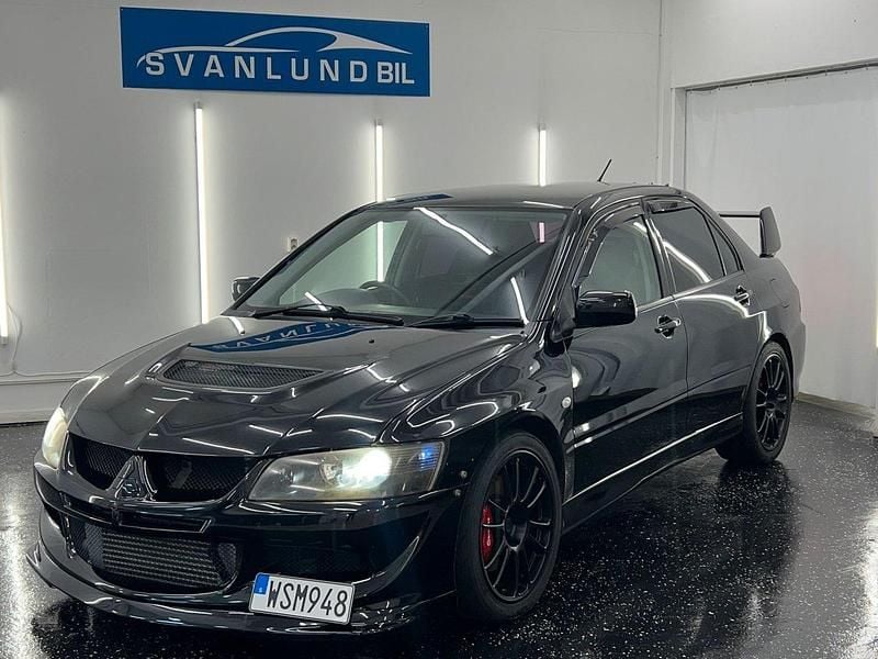 Svart Begagnad 2003 Mitsubishi Lancer Sedan | 299 800 kr - Bild 1/4