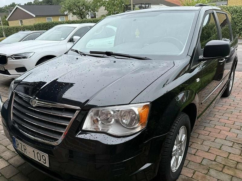 Svart Begagnad 2010 Chrysler Grand Voyager Minibuss | 80 000 kr (Marknadspris) - Bild 1/4