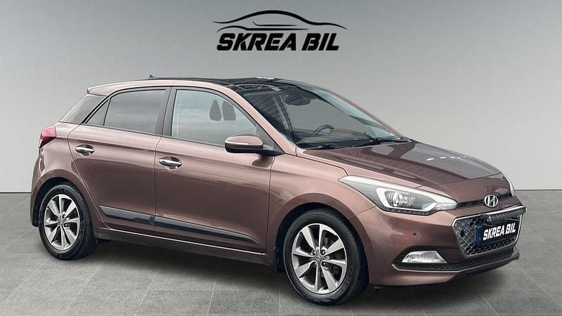 Brun Begagnad 2016 Hyundai i20 Premium Halvkombi | 79 900 kr (Marknadspris) - Bild 1/4