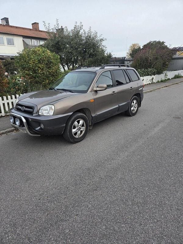 Brun Begagnad 2005 Hyundai Santa Fe SUV | 12 000 kr (Bra pris) - Bild 1/4