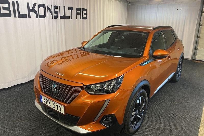 Orange Begagnad 2021 Peugeot e-2008 Allure SUV | 185 000 kr (Marknadspris) - Bild 1/4