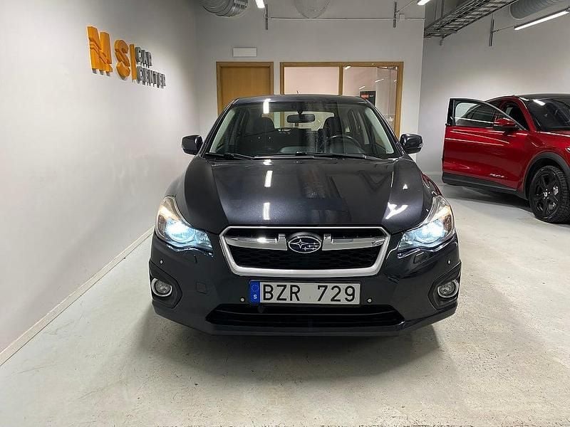 Begagnad Subaru Impreza 114 HK (83 kW) 2013 Mörkgrå Halvkombi
