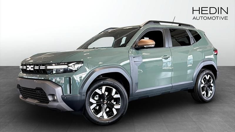 Grå (green) Begagnad 2025 Dacia Duster Extreme SUV | 314 900 kr (Marknadspris) - Bild 1/4