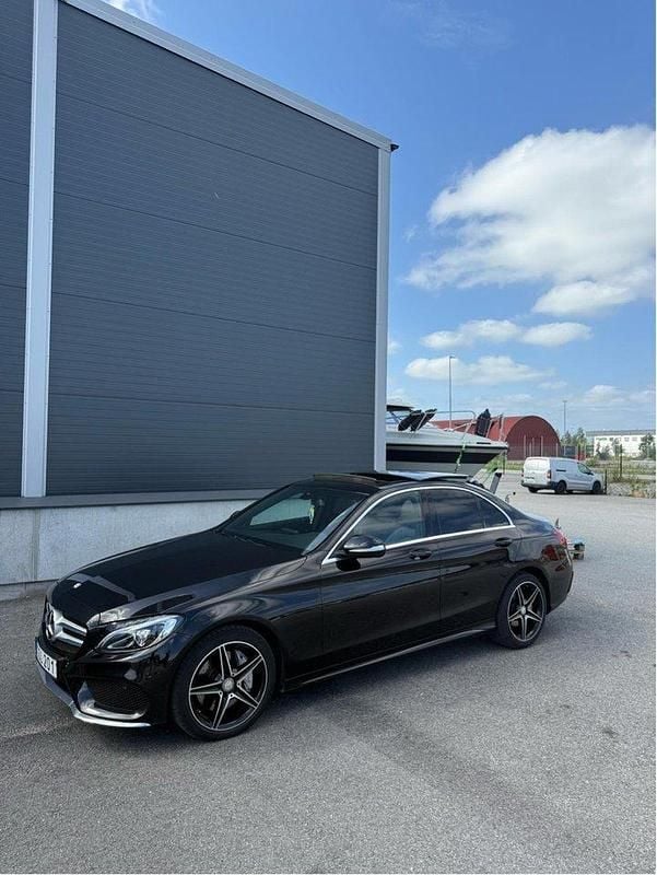 Svart Begagnad 2015 Mercedes C250 AMG line Sedan | 229 500 kr (Bra pris) - Bild 1/4