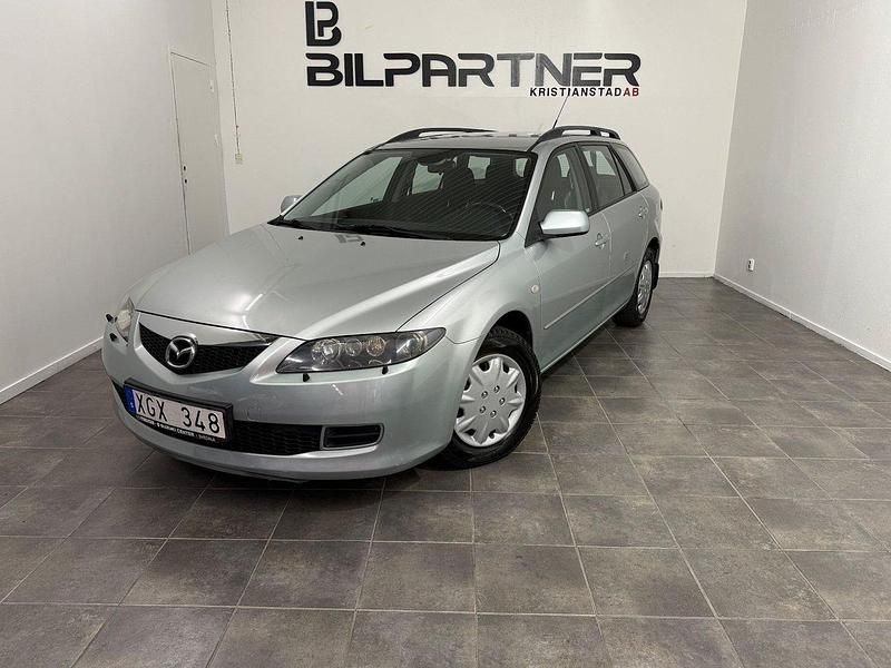 Grå Begagnad 2005 Mazda 6 Touring Kombi | 34 900 kr (Marknadspris) - Bild 1/4