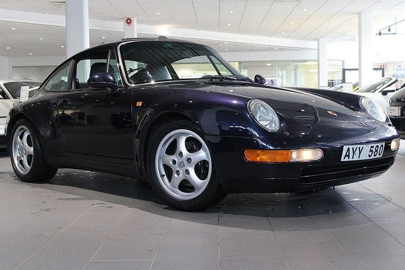 Mörkblå Begagnad 1996 Porsche 911 Carrera | 885 000 kr - Bild 1/4