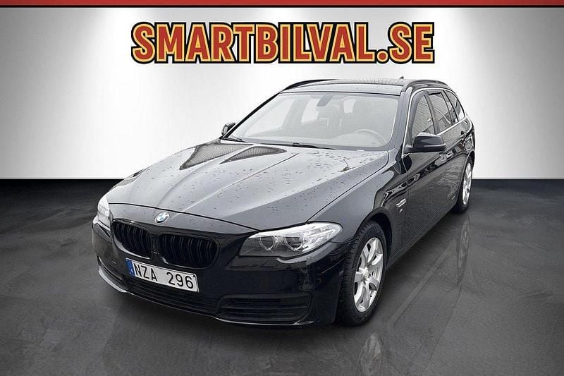 Svart Begagnad 2013 BMW 520 Kombi | 129 900 kr (Marknadspris) - Bild 1/4