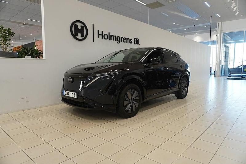 Mörkgrön Begagnad 2022 Nissan Ariya Evolve SUV | 399 900 kr (Marknadspris) - Bild 1/4