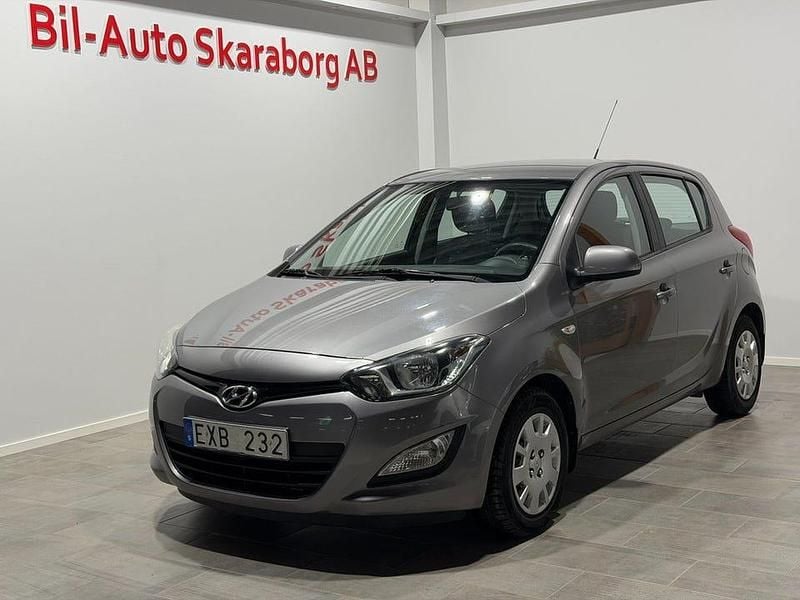Mörkgrå Begagnad 2012 Hyundai i20 Select Halvkombi | 49 500 kr (Marknadspris) - Bild 1/4