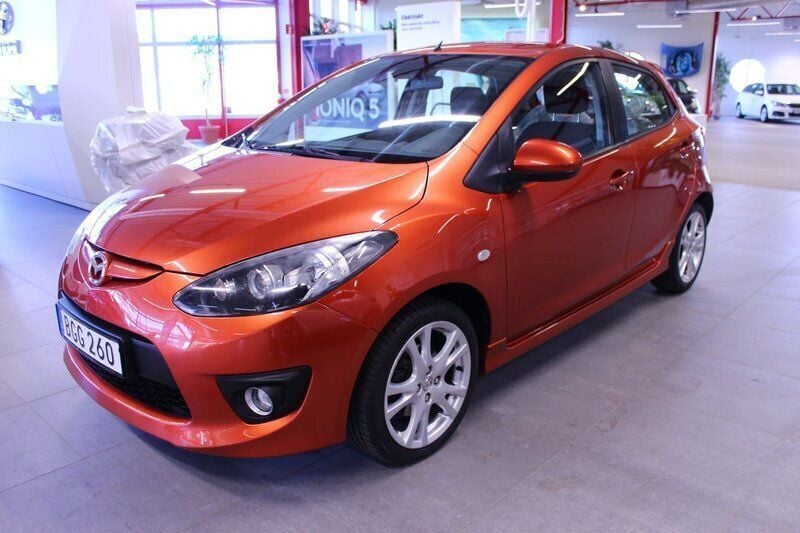 Orange Begagnad 2010 Mazda 2 Halvkombi | 59 000 kr (Lite dyr) - Bild 1/4
