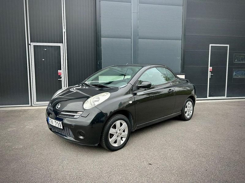 Svart Begagnad 2006 Nissan Micra C+C Cab | 39 900 kr (Marknadspris) - Bild 1/4
