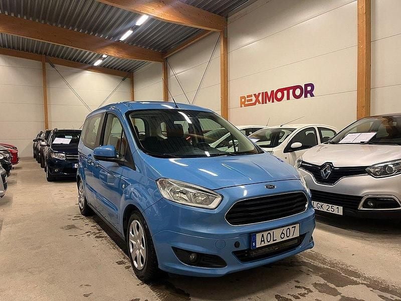 Blå Begagnad 2014 Ford Tourneo Courier Minibuss | 99 900 kr - Bild 1/4